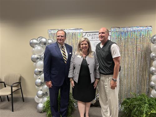 Dr. Ed Nichols with mayor paul finley and the chamber of commerce president